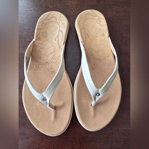 Olu Kai  Tan and Cream Flip-Flops